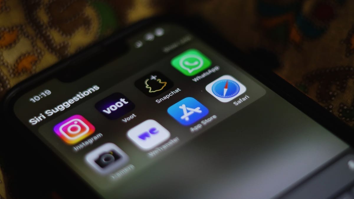 Detailed view of a smartphone home screen displaying various social media and utility apps.